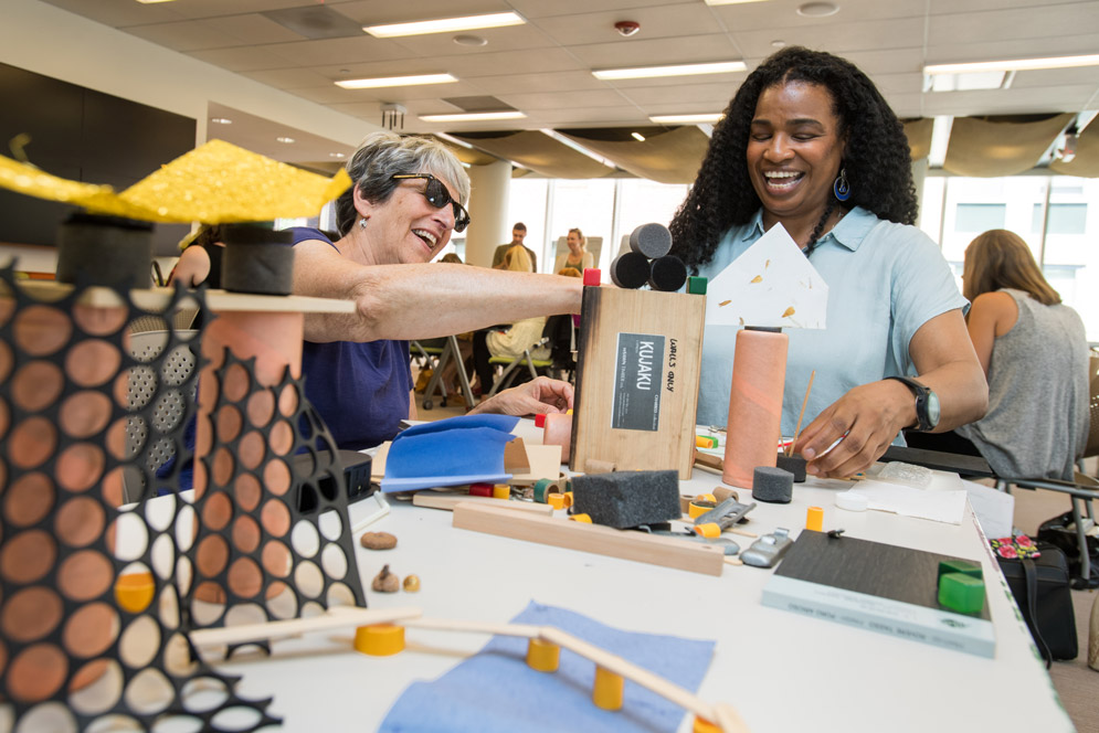 Teachers try out some of the creative activities