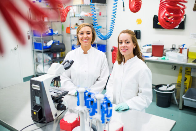 Whitney Manhart (MED'20) (left) a PhD student in Elke Muhlberger’s NEIDL lab, and lab manager Jennifer Pacheco are coauthors of a Cell Reports study about a tool that will help determine whether a new zoonotic virus, LLOV, can cause disease in humans. Photo by Jackie Ricciardi