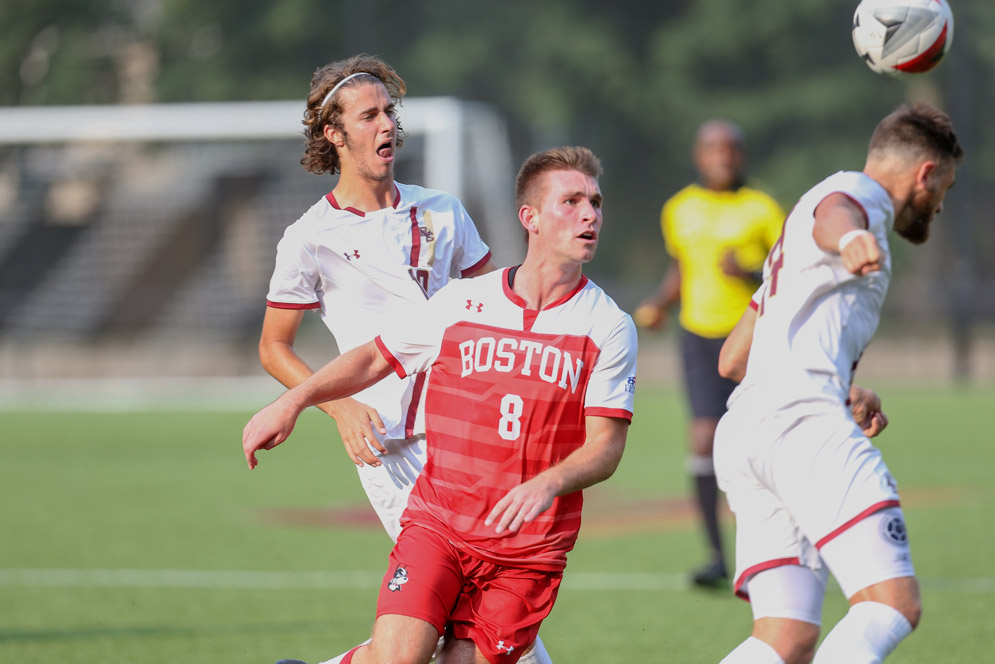 Matt McDonnell heads a soccer ball during a game