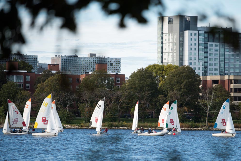 Sailboats fill the Charles River