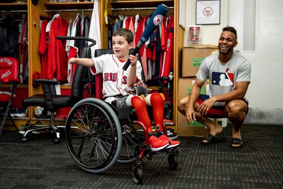 children from Shriners Hospital visited Xander Bogaerts and the team in the locker room