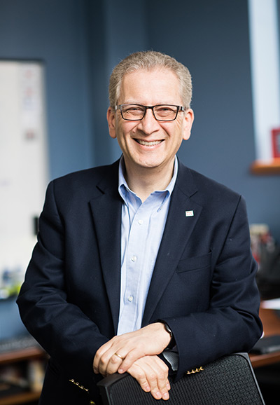 Portrait of Azer Bestavros, founder of Boston University’s Rafik B. Hariri Institute for Computing and Computational Science & Engineering, in his office.