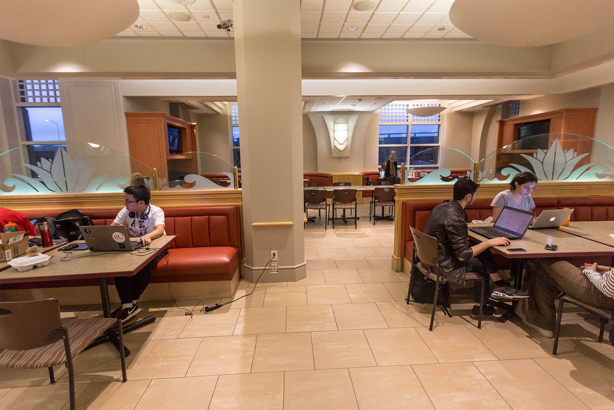 Interior view of Boston University students studying at the Buick Street Market and Cafe.