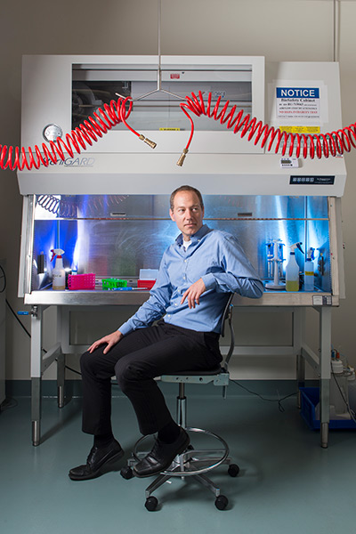 Portrait of Infectious Diseases researcher John Connor at the Boston University National Emerging Infectious Diseases Laboratories (NEIDL)