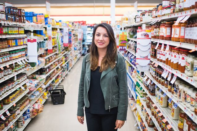 Researcher Didem Kurt poses for a photo in a grocery store