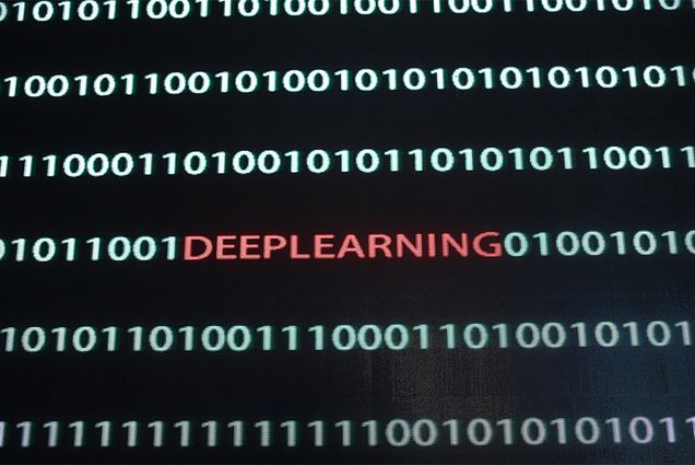 Artificial Intelligence concept graphic showing lines of binary code interupted with the word deeplearning.