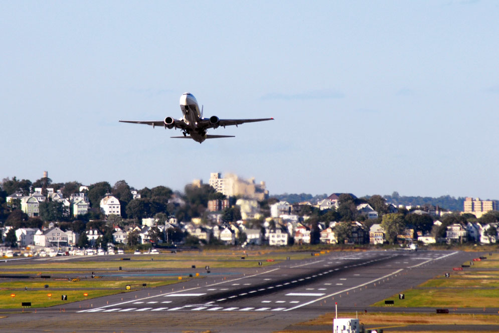 plane taking off from Logan Airport, Boston, MA Photo by SPO123/iStock