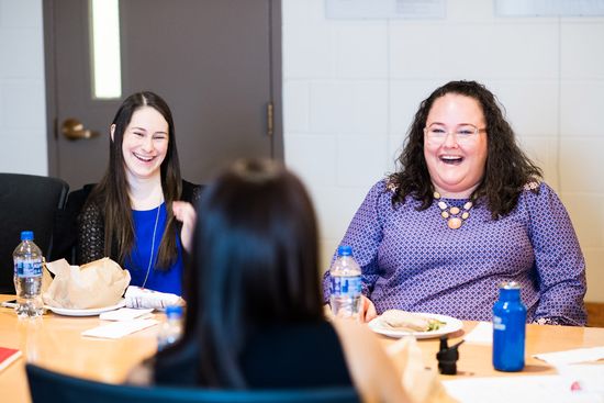 Felicia Gans and and Lindsay Roth laugh