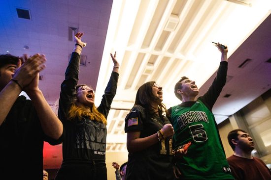 Students celebrate the Patriot's Victory at the Super Bowl viewing party