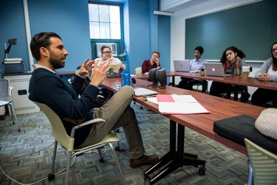 Salimi leads his class through a parsing of Shakur’s songs to discern their social commentary.