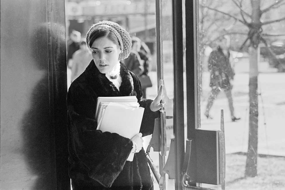 A student goes out into the cold