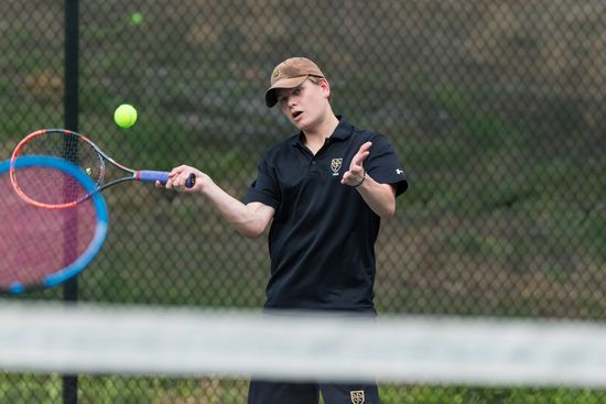 Ekholm playing tennis