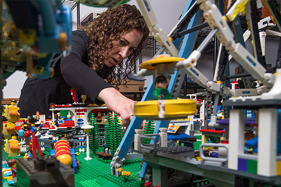 Sea Urchin biology researcher Cynthia Bradham works on constructing a new part of her LEGO city that took her more than 10 years to build.