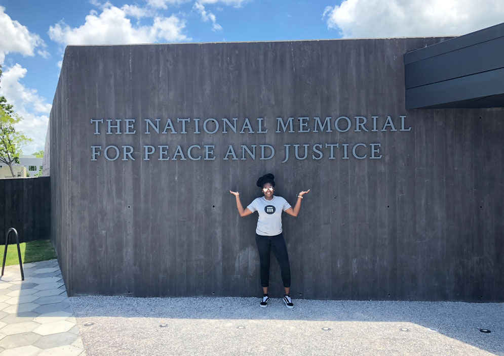 Akanni in front of the National Memorial for Peace and Justice, which commemorates the victims of lynching in the United States, run by the Equal Justice Initiative, where Akanni interned last summer. Photo courtesy of Akanni