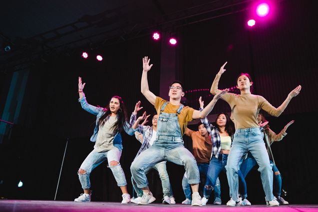 The Fusion dance team performs on stage