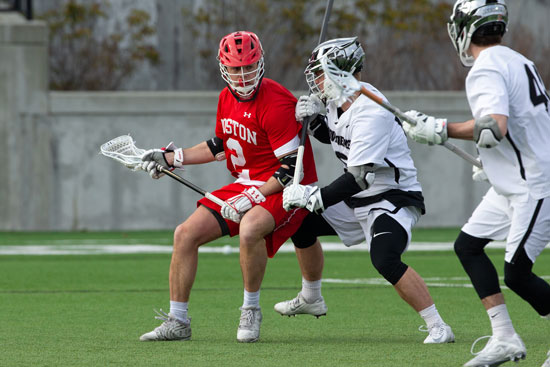 James Burr playing lacrosse