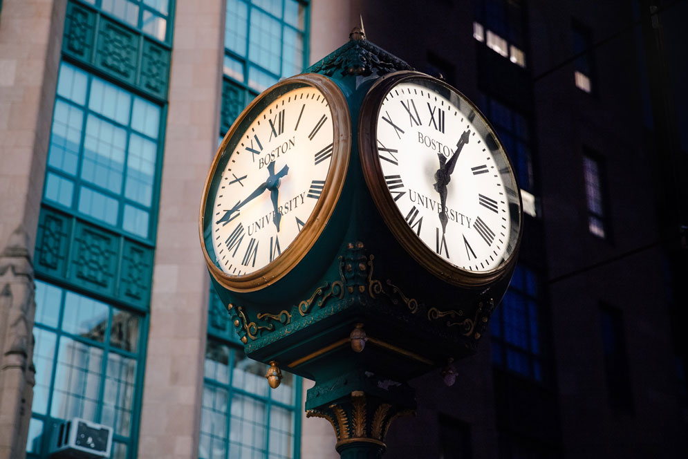 A clock showing day on one side and night on the other