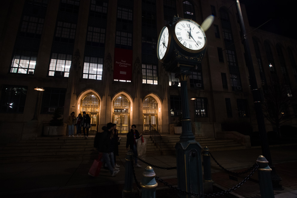 The clock outside the Tsai Performance center at night