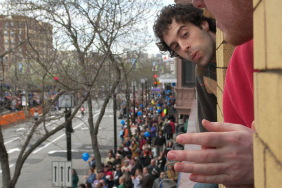 boston marathon onlookers poking their heads out of windows