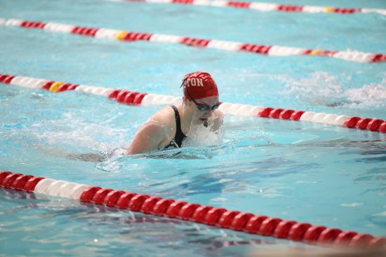 Erin Nabney swimming in the Patriot's League championship