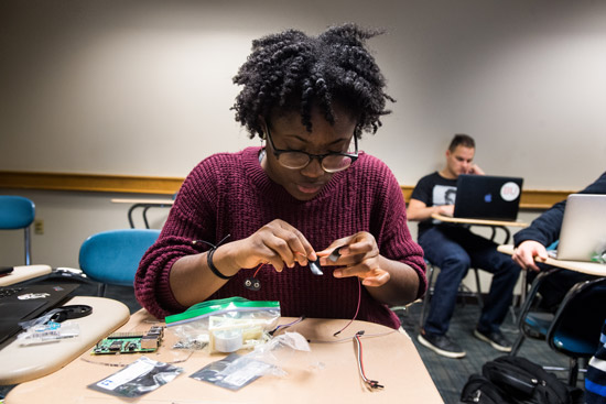 Marybelle Raymond building a simple robot