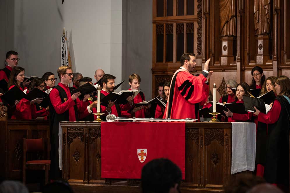 Marsh Chapel Music Director Scott Allen Jarrett conducts the choir