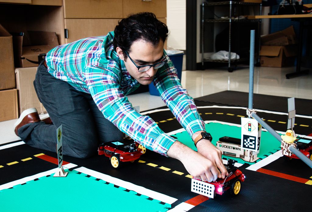 Arian Houshmand(ENG'20) is an internantional student in Systems Engineering from Iran. Houdhman and his teammatesbuilt a traffic simulation in the lab to run demos. Houshmand and his teammates each built a demo car and named the cars after their names.