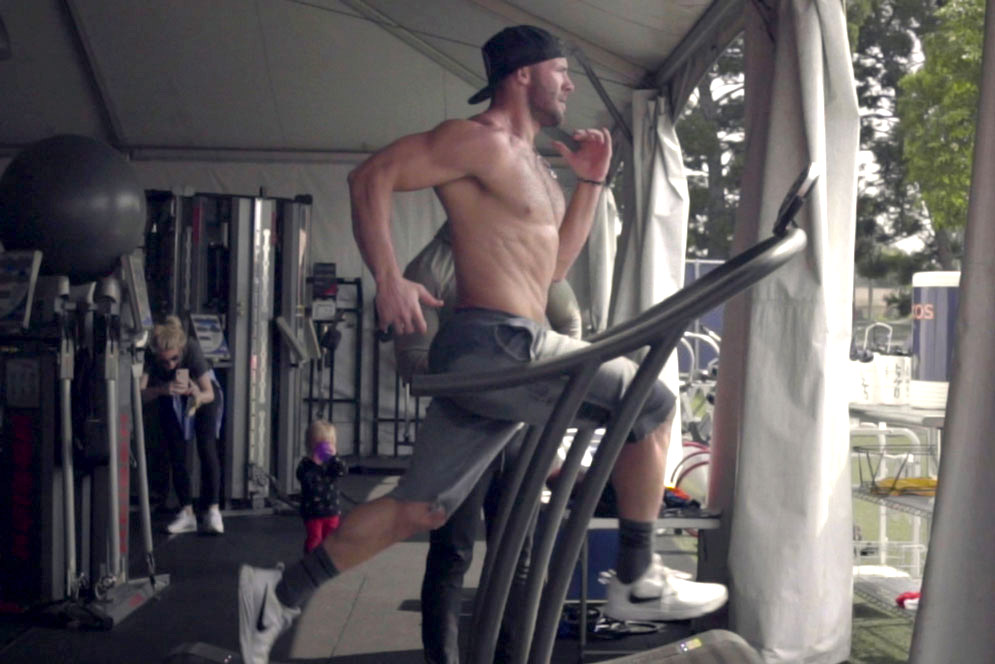 Julian Edelman sprints on a treadmill in the gym 
