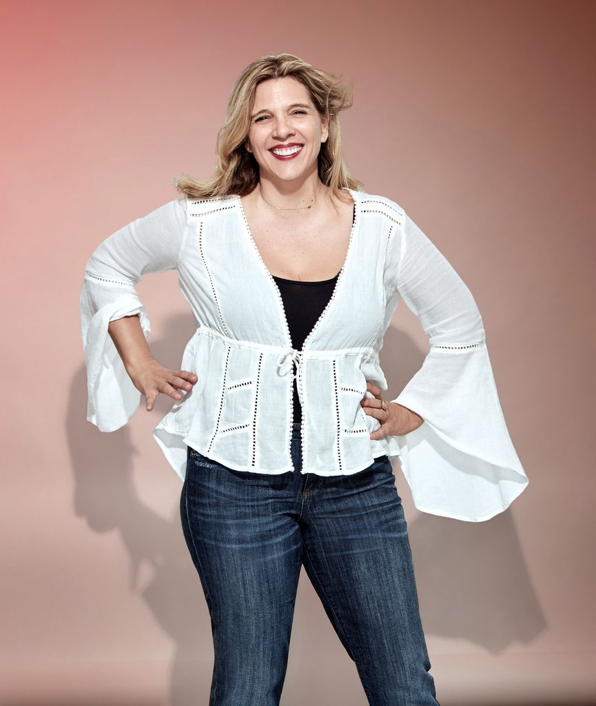 portrait of Krista Vernoff standing with her hands on her hips