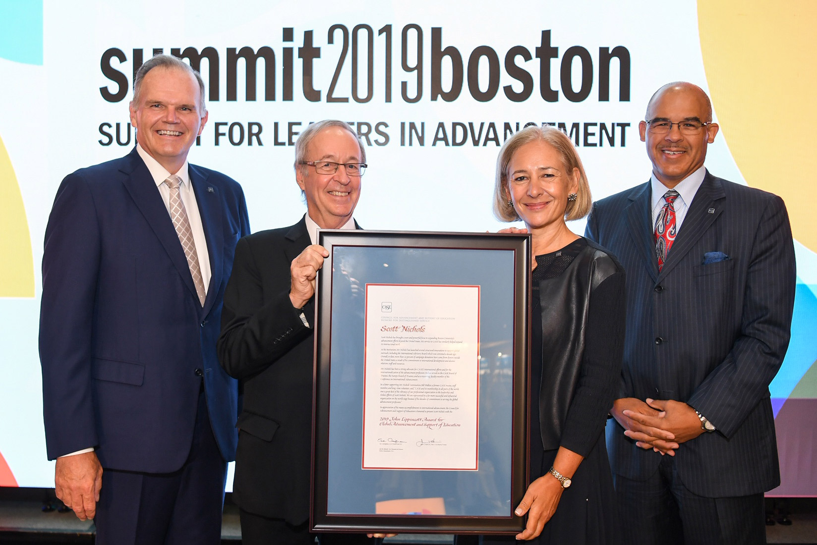 In the photo, left to right, is Jim Harris, President of University of San Diego and Chair of the CASE Board of Trustees; Scott Nichols; Sue Cunningham, President and CEO of CASE; Jim Moore, President of the University of Illinois Foundation and Chair of the CASE Board of Trustees.