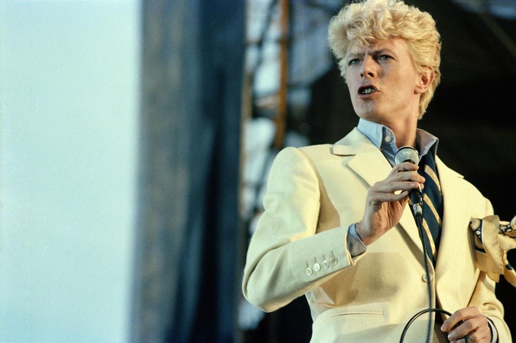 David Bowie performs on stage at the Milton Keynes Bowl as part of the Serious Moonlight tour on July 02, 1983.