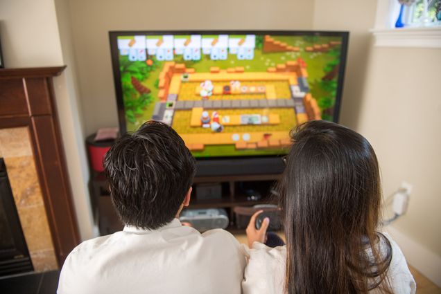 a couple plays a video game