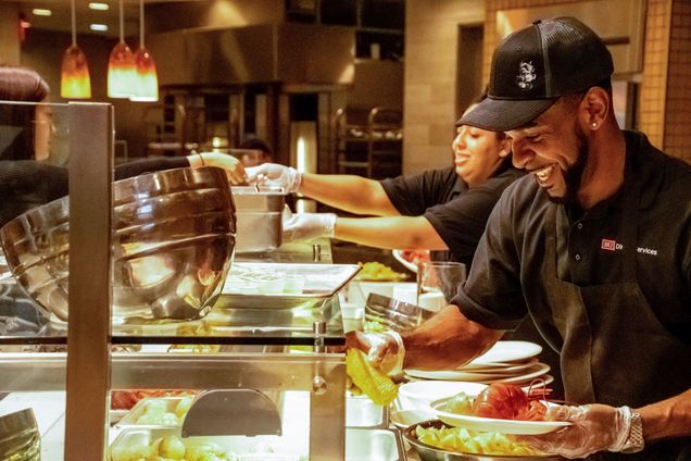 Arthur Jeffries, an employee since 2011, prepares a fresh plate of lobster