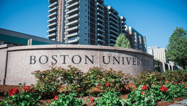 Boston University sign at the intersection of Commonwealth Ave and Beacon St in Boston.