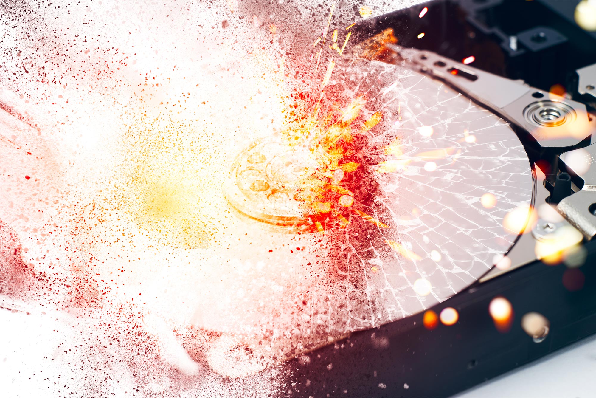 Illustration of a computer hard disk exploding.
