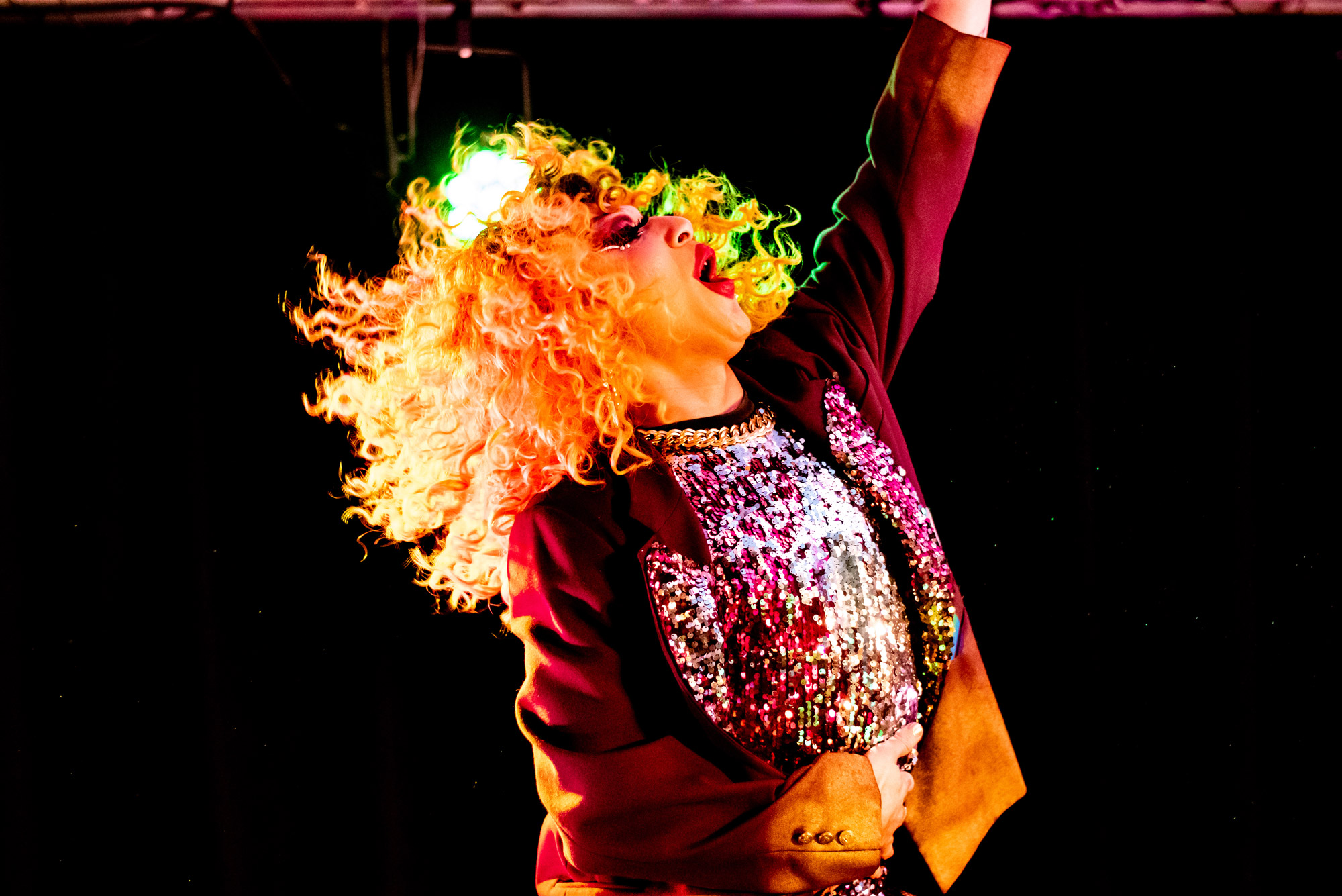 Pristine Cristine strikes the stage during the National Coming Out Day Party