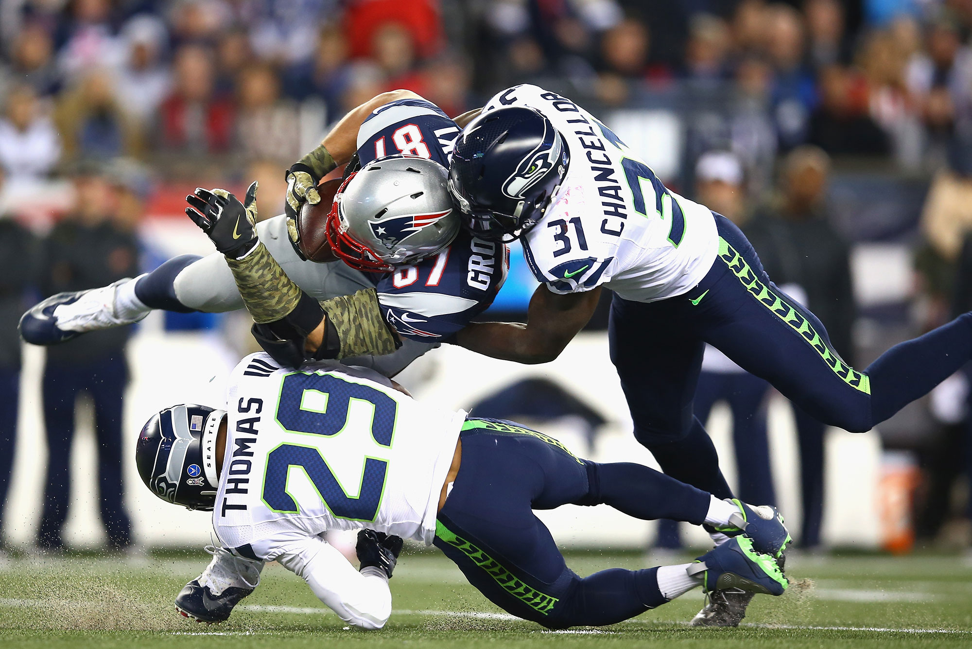 Patriots player Rob 'Gronk' Gronkowski gets tackled during a game against the Seattle Seahawks.