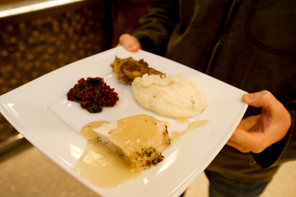 A photo of a plate of Thanksgiving food