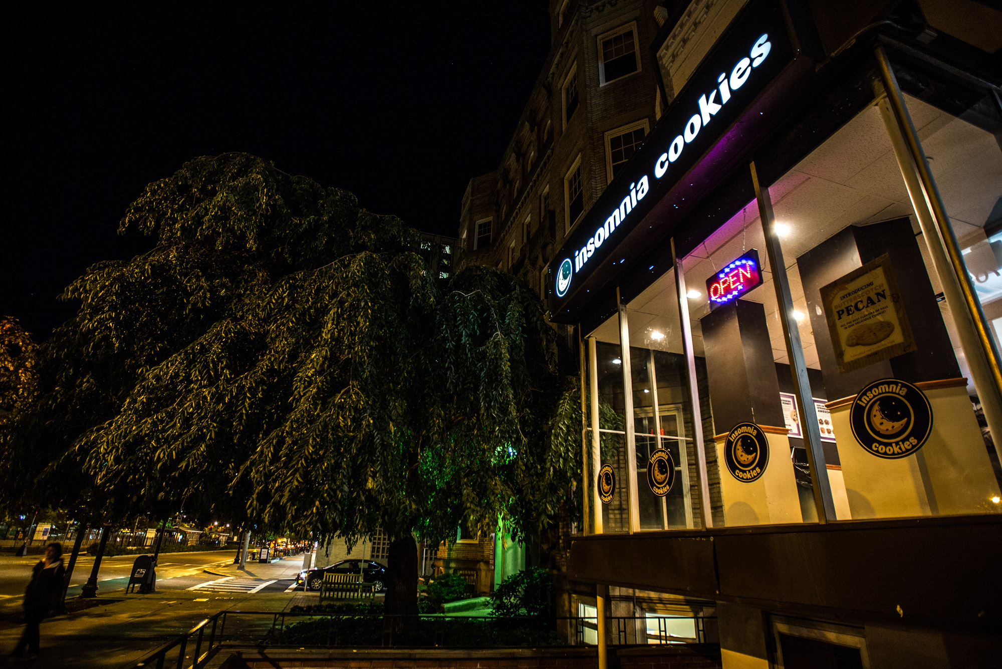 The Insomnia Cookies sign glows late at night