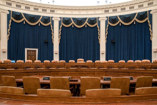 Interior view of the empty United States Federal Ways and Means Committee meeting room.