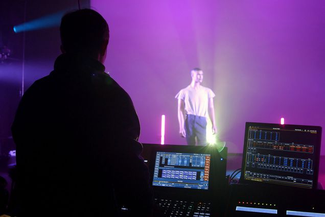 Someone uses the light studio to play around with lighting in the Booth theatre