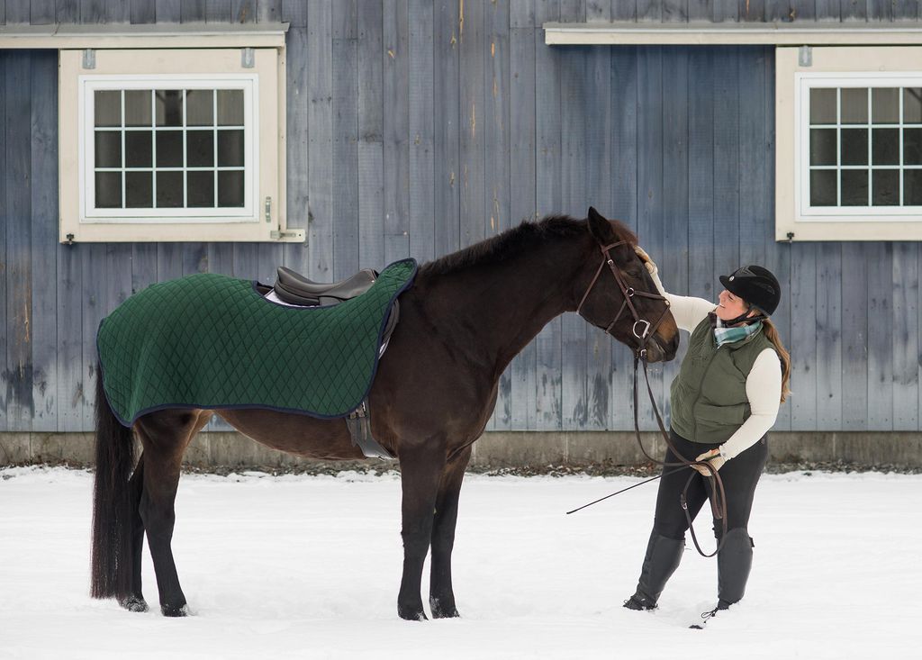 Sorcha Martin pets her horse Maeve