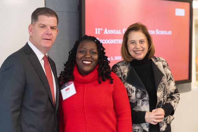 Mayor Martin Walsh and Tanya Zlateva, Dean of the Metropolitan College congratulate Katy Janvier on being recognized a City of Boston Scholar, during the 11th annual City of Boston Scholarship Reception at the Boston University Metropolitan College.