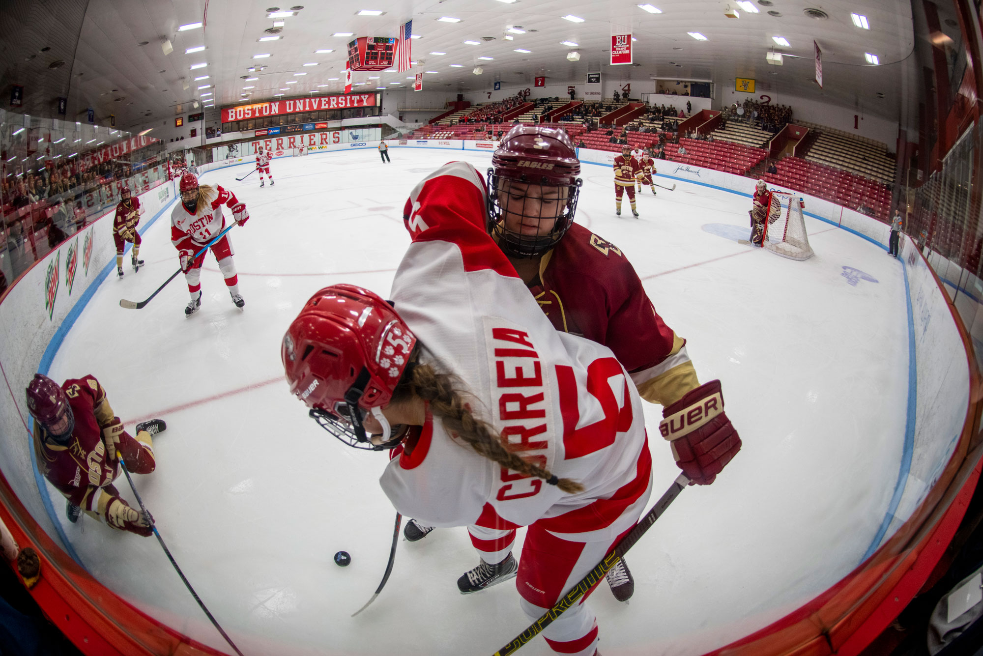 BU’s Courtney Correia (CGS’20) battles for the puck up against the boards during the second period of the 2020 Women’s Beanpot semifinal against Boston College at Walter Brown Arena on Feb 4, 2020.