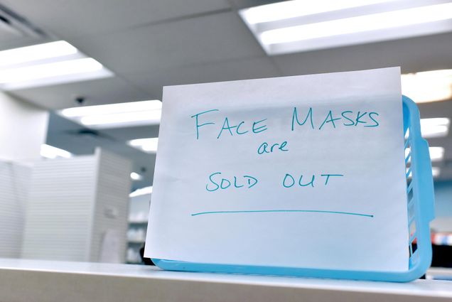 A photo of a sign in New York reading "Face Masks Are Sold Out"