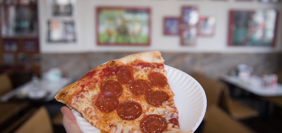 A slice of T. Anthony's pizza.