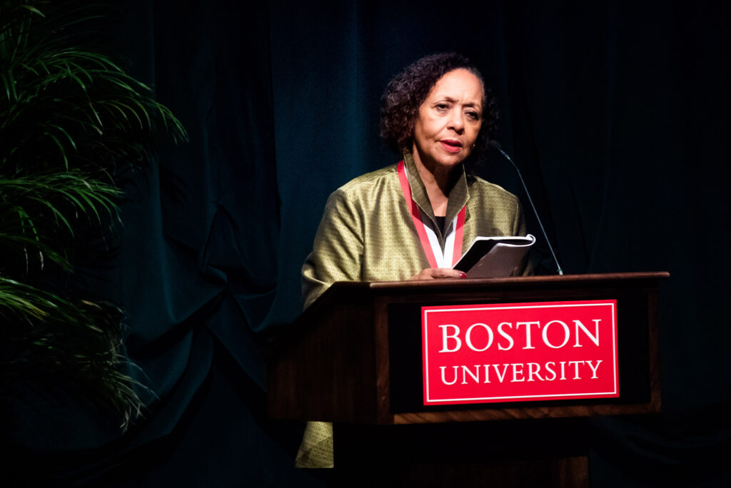 Carol Jenkins (Wheelock’66) speaks at a podium after receiving an award during BU Alumni Weekend in 2019.