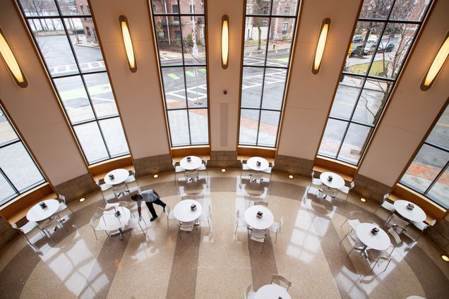 A photo of an employee cleaning Marciano Commons at BU