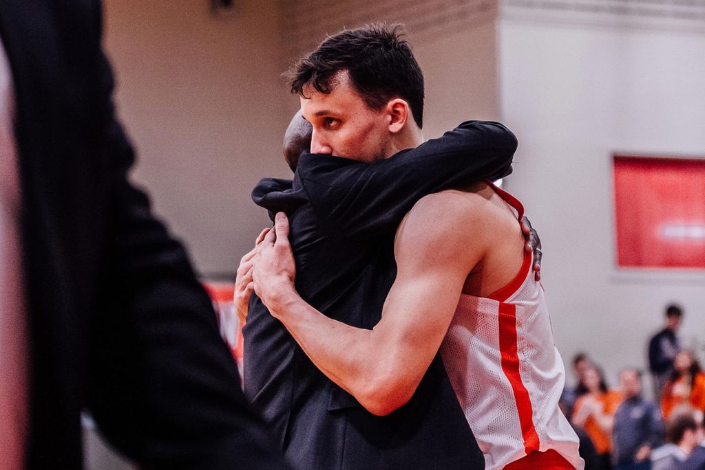 A photo of Max Mahoney (Questrom’20) and BU coach Joe Jones hugging