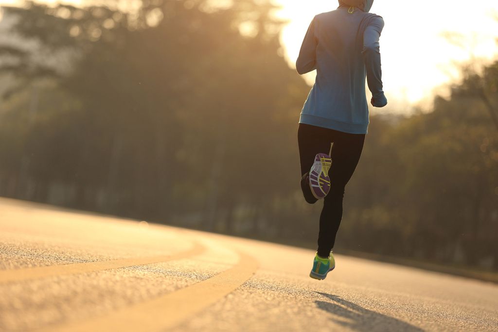 A photo of someone running down the street